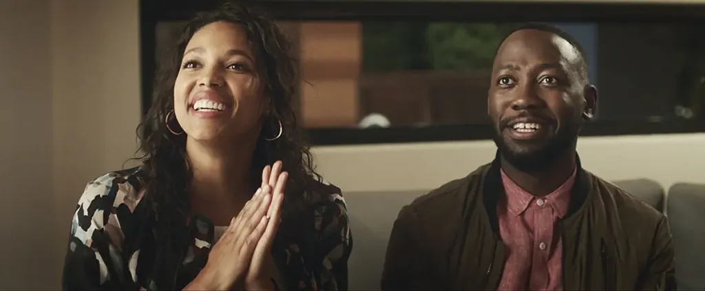 Lamorne Morris and Kylie Bunbury in Game Night (2018) 